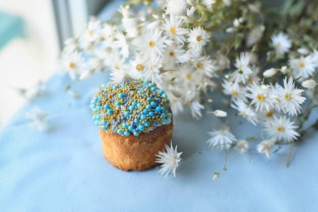 Orthodox Easter cake decorated with beads and daisies in the blue background , 49427528.jpg, april, background, baked, bakery, beads, blue, bread, breakfast, brioche, cake, candy, celebrate, celebration, chamomile, colorful, culture, daisies, decor, decorated, decoration, dessert, easter, egg, eggs, flower, food, fresh, frosting, fruit, gourmet, green, holiday, icing, meal, orthodox, pastry, pearl, pie, raisin, religion, Russian, spring, sugar, sweet, table, tradition, traditional, ukrainian, white, yellow RECORD DATE NOT STATED