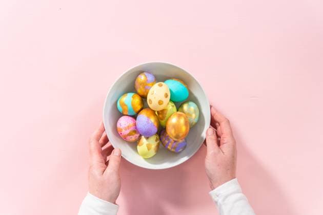 Colored and painted with gold hard-boiled eggs on a pink background. , 49726858.jpg, Cooked egg, Easter, Easter egg, Easter egg coloring, Egg, Gold, Hard boiled eggs, Holiday, Multi Colored, Pink, Spring holiday, dye, dyeing, multi color, multicolor, painted RECORD DATE NOT STATED