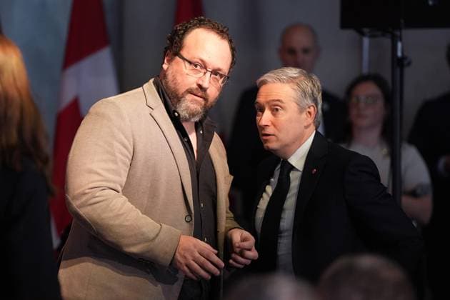 February 7, 2025, Toronto, On, Canada: Industry Minister Francois-Philippe Champagne (right) and Flavio Volpe, head of the Automotive Parts Manufacturers Association, talk before the start of a Canada-U.S. economic summit in Toronto, Friday, Feb.7, 2025. Toronto Canada  - ZUMAc35_ 20250207_zaf_c35_016 Copyright: xFrankxGunnx