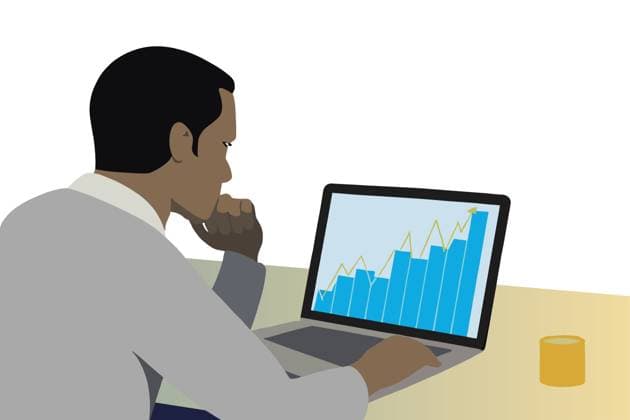 PR_ID26444_10534_BusinessIi.jpg A focused individual examines upward trending financial graphs on a laptop in a neat, modern workspace, emphasizing analytical skills and business insights., Property released Model Released AdalbertoRodriguez_ID26444_763067_007 Copyright: xAdalbertoxRodriguezx RECORD DATE NOT STATED