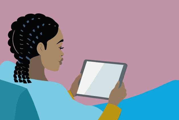 PR_ID26444_10534_BusinessIi.jpg An African American woman with braided hair sits comfortably, holding a tablet. She appears engaged in her activity, surrounded by a softly colored background that enhances the relaxed atmosphere., Property released Model Released AdalbertoRodriguez_ID26444_763071_011 Copyright: xAdalbertoxRodriguezx RECORD DATE NOT STATED