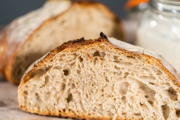 Sliced baked sourdough rye loaf of bread. , 50429740.jpg, Active culture, Bread, Container, Food, Glass container, Healthy eating, Homemade, Jar, Mason jars, Sourdough, Sourdough bread, Sourdough starter, active, artisan, bread starter, bubble, classic, dough, fermentation, glass, handmade, healthy, home made, leaven, loaf, rising, rustic, slice, sliced, starter, wild yeast, yeast RECORD DATE NOT STATED