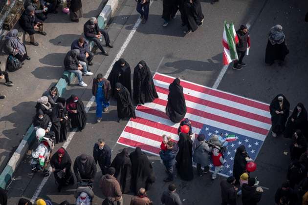 News Themen der Woche KW07 News Bilder des Tages 46th Islamic Revolution Victory Anniversary Iranian demonstrators walk on the U.S. flag displayed on Azadi Avenue while participating in a rally commemorating the 46th anniversary of the victory of Iran s 1979 Islamic Revolution in western Tehran, Iran, on February 10, 2025. The Iranian Islamic Revolution, which leads to the overthrow of the Pahlavi dynasty in 1979, replaces the Imperial State of Iran with the present-day Islamic Republic of Iran. Tehran Tehran Iran  Copyright: xMortezaxNikoubazlx originalFilename: nikoubazl-46thisla250210_nphMO.jpg