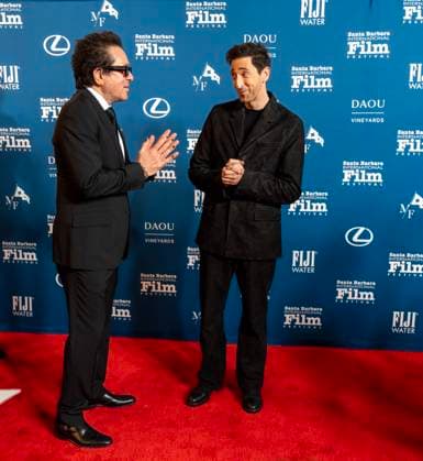 February 13, 2025, Santa Barbara, California, USA: Adrien Brody is greeted by Festival Executive Director Roger Durling as he arrives at the red carpet Thursday night to receive the Cinema Vanguard Award at the 40th annual Santa Barbara International Film Festival. Spotlighting their performances in Brady CorbetÃ¢â‚¬â ¢s THE BRUTALIST, BrodyÃ¢â‚¬â ¢s portrayal of Toth highlights an immigrantÃ¢â‚¬â ¢s struggle to overcome his war-torn past and rebuild his life in a Post-War America. Pearce, in contrast, delivers a chilling, domineering performance as a wealthy art patron whose vision of American modernity collides with TothÃ¢â‚¬â ¢s. The tension between the two not only drives the narrative but also symbolizes the larger struggle between inn - ZUMAa35_ 20250213_zaf_a35_020 Copyright: xDanielxA.xAndersonx