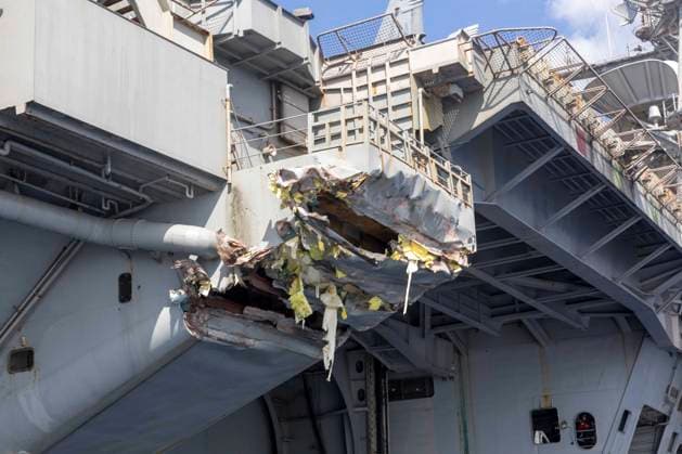 News Themen der Woche KW07 News Bilder des Tages View of the exterior damage to USS Harry S. Truman (CVN 75) viewed from a ship s rigid-hull inflatable boat following a collision on February 12, 2025, with the merchant vessel Besiktas-M, while operating in the vicinity of Port Said, Egypt. The aircraft carrier, the flagship of the Harry S. Truman Carrier Strike Group (HSTCSG), is on a scheduled deployment in the U.S. 6th Fleet area of operations supporting U.S. Naval Forces Europe-Africa to defend U.S., Allied and partner interests.  WAX2025021407 MC1xCODYxBEAM
