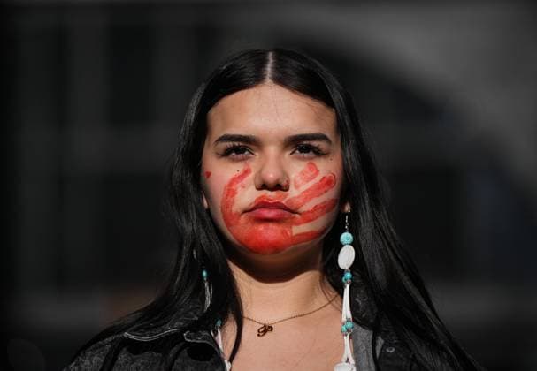 February 14, 2025, Vancouver, Bc, CANADA: A young woman sports a red hand print on her face while participating in the annual Women s Memorial March, in Vancouver, on Friday, February 14, 2025. The march is held to honour missing and murdered Indigenous women and girls from the community with stops along the way to commemorate where women were last seen or found. Vancouver CANADA  - ZUMAc35_ 20250214_zaf_c35_111 Copyright: xDarrylxDyckx