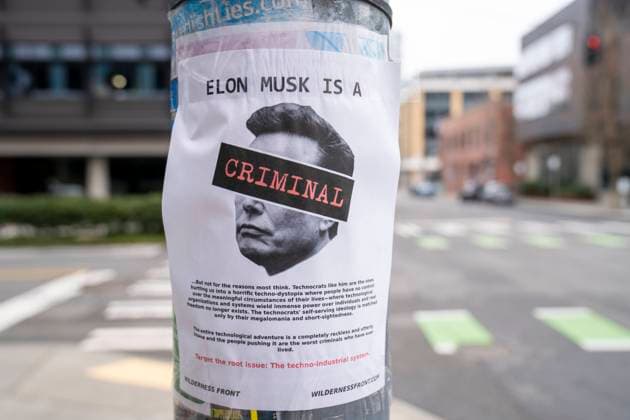 February 15, 2025, Seattle, Washington, USA: A flyer put up on a street pole depicts billionaire Elon Musk and says Elon Musik is a Criminal near a Tesla car dealership in the South Lake Union area of Seattle, Washington, USA, on Sat., Feb. 15, 2025. Seattle USA - ZUMAb344 20250215_znp_b344_032 Copyright: xScottxBrauerx