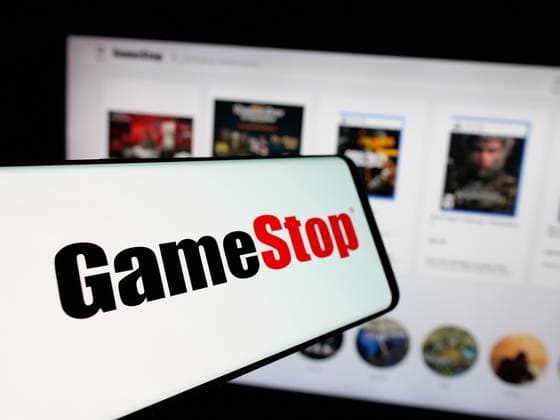 Illustration in Germany. In this photo illustration, a mobile phone with the logo of American video game retail company GameStop Corp. is seen on screen in front of website. Germany Copyright: xTimonxSchneiderx xSOPAxImagesx TSCHNEIDER_47938 GameStop P3216455