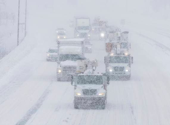 (250217) -- MISSISSAUGA, Feb. 17, 2025 -- Vehicles are seen on a low-visibility snowy day on Highway 403 in Mississauga, the Greater Toronto Area, Canada, on Feb. 16, 2025. (Photo by Xinhua) CANADA-THE GREATER TORONTO AREA-WINTER STORM ZouxZheng 