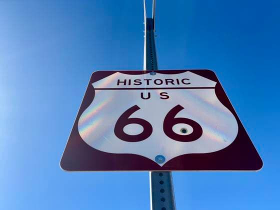 Historic Route 66 road sign against a clear blue sky in Arizona. Ash Fork, Arizona, United States R_RMYC250216-1649775-01