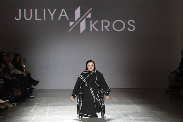 KYIV, UKRAINE - FEBRUARY 15, 2025 - A model in a wheelchair takes the catwalk during the fashion show by the Juliya Kros brand as part of Ukrainian Fashion Week FW25-26 at the Mystetskyi Arsenal National Cultural, Art and Museum Complex, Kyiv, capital of Ukraine Juliya Kros fashion show at UFW in Kyiv  Copyright: xPavloxBahmutx