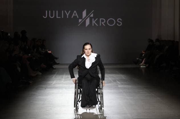 KYIV, UKRAINE - FEBRUARY 15, 2025 - A model in a wheelchair takes the catwalk during the fashion show by the Juliya Kros brand as part of Ukrainian Fashion Week FW25-26 at the Mystetskyi Arsenal National Cultural, Art and Museum Complex, Kyiv, capital of Ukraine Juliya Kros fashion show at UFW in Kyiv  Copyright: xPavloxBahmutx