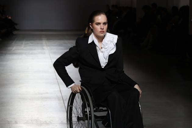 KYIV, UKRAINE - FEBRUARY 15, 2025 - A model in a wheelchair takes the catwalk during the fashion show by the Juliya Kros brand as part of Ukrainian Fashion Week FW25-26 at the Mystetskyi Arsenal National Cultural, Art and Museum Complex, Kyiv, capital of Ukraine Juliya Kros fashion show at UFW in Kyiv  Copyright: xPavloxBahmutx
