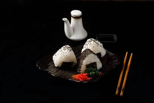 IMAGO Creative, Food, Japan, Onigiri onigiri three balls or triangles of rice on black background japanese food 25737717 RECORD DATE NOT STATED