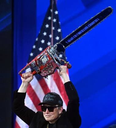 February 20, 2025, Oxen Hill, Maryland, USA: Tesla SpaceX s ELON MUSK is given a chainsaw as a gift by Argentine President Millei during his appearance at CPAC, the annual Conservative Political Action Conference at the Gaylord Convention Center in Oxen Hill. Oxen Hill USA - ZUMAg208 20250220_aap_g208_003 Copyright: xCarolxGuzyx