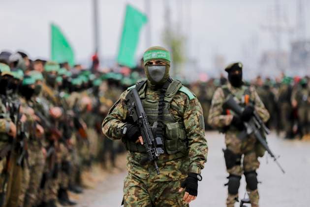 Hamas frees 6 hostages Hamas fighters gather at the site of the handing over of Israeli hostages at the Nuseirat refugee camp in the central Gaza Strip as part of the seventh hostage-prisoner release on February 22, 2025. Hamas s armed wing confirmed it will hand over on February 22 six hostages held alive in the Gaza Strip as part of the ongoing ceasefire deal with Israel. Gaza Gaza Strip Palestinian territories Copyright: xSaeedxJarasx