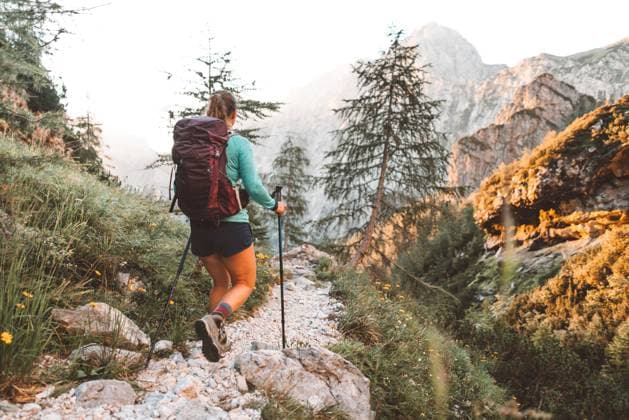 Caucasian woman hiking with Backpack on the Beautiful trail in European Alps early in the morning. Travel and Adventure Concept. High quality photo, model released, , 51013044.jpg, sport, trekking, girl, walking, love, summer, freedom, leisure, nature, mountain, travel, activity, caucasian, tree, hiker, vacation, male, outdoors, sun, tourism, two, backpack, active, sunny, tourist, hike, female, top, hill, healthy, landscape, couple, woman, man, lifestyle, climbing, adventure, young, outdoor, enjoying, person, happy, people, spring, view, hand, hiking, together RECORD DATE NOT STATED