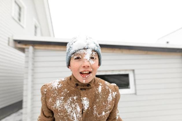 Creative Highlights Symbolfotos Portrait of boy with snow in his face model released, Symbolfoto, KMKF00709