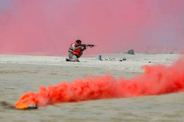 February 23, 2025, Konarak, Sistan And Baluchestan, Iran: The amphibious operation, along with beaching and coastal defense activities, conduct by Navy rangers with the assistance of a Navy frigate and the armored units of the Islamic Republic of Iran Army s Ground Forces in the third maritime zone of Konarak in the Persian Gulf. An amphibious operation refers to a coordinated attack from the sea, performed by naval and land forces deploying from ships, aimed at striking the enemy s shoreline and culminating in troops landing on those shores. Konarak Iran - ZUMAi98_ 20250223_zih_i98_069 Copyright: xIranianxArmyxOfficex