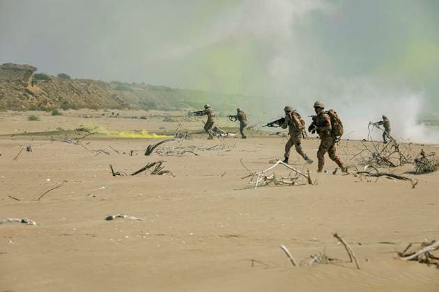February 23, 2025, Konarak, Sistan And Baluchestan, Iran: The amphibious operation, along with beaching and coastal defense activities, conduct by Navy rangers with the assistance of a Navy frigate and the armored units of the Islamic Republic of Iran Army s Ground Forces in the third maritime zone of Konarak in the Persian Gulf. An amphibious operation refers to a coordinated attack from the sea, performed by naval and land forces deploying from ships, aimed at striking the enemy s shoreline and culminating in troops landing on those shores. Konarak Iran - ZUMAi98_ 20250223_zih_i98_077 Copyright: xIranianxArmyxOfficex