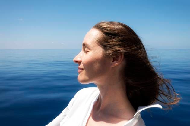 Creative Highlights Symbolfotos Seychelles, Indian Ocean, profile of woman on ferry enjoying breeze model released, Symbolfoto, NDF00908