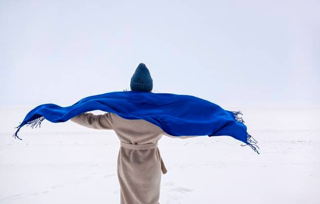 Creative Highlights Symbolfotos Woman in a blue scarf standing in a snowy field during winter model released, Symbolfoto, MBLF00754