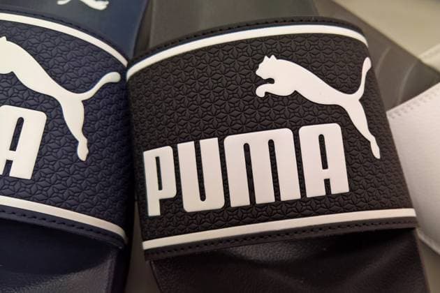 Puma Schuhe - Badeschuhe. Die Puma SE ist ein börsennotierter deutscher Hersteller von Sportartikeln, unter anderem von Schuhen, Textilien und Accessoires, mit Sitz in Herzogenaurach *** Puma Schuhe Badeschuhe Puma SE is a listed German manufacturer of sporting goods, including footwear, textiles and accessories, headquartered in Herzogenaurach, Germany