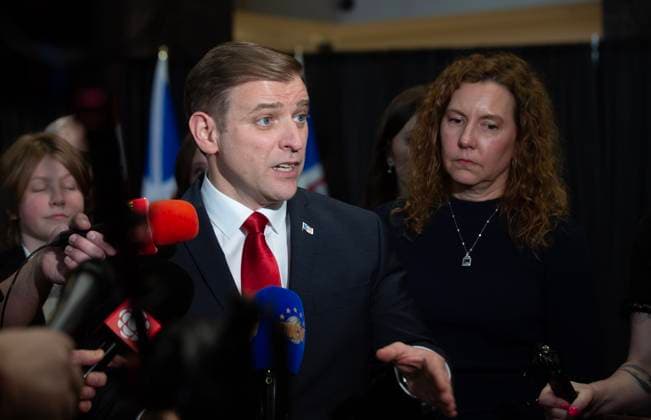 February 25, 2025, St. John s, Nl, CANADA: Newfoundland and Labrador Premier Andrew Furey holds a news conference as his wife Allison looks on in St.John s, Tuesday, Feb. 25, 2025. Furey announced his resignation as premier. St. John s CANADA  - ZUMAc35_ 20250225_zaf_c35_037 Copyright: xPaulxDalyx