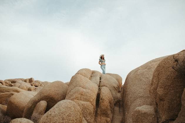 Creative Highlights Symbolfotos Adventurous Spirit: Young Woman Exploring Joshua Tree National Park Joshua Tree, California, United States CR_JKPU250225-1662173-01 ,model released, Symbolfoto