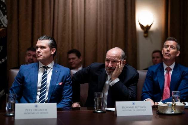 Cabinet Meeting Highlights Tensions Over Musks Federal Demands Pete Hegseth, US secretary of defense, Howard Lutnick, US commerce secretary, and Sean Duffy, US secretary of transportation, during a cabinet meeting at the White House in Washington, DC, US, on Wednesday, Feb. 26, 2025. Elon Musk s demand that more than two million federal employees defend their work is facing pushback from other powerful figures in the Trump administration, in a sign that the billionaire s brash approach to overhauling the government is creating division. Photo by Al Drago Pool ABACAPRESS.COM Washington DC  Copyright: xPool ABACAx