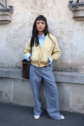 February 27, 2025, Milan, Lombardia, Italy: Milan Womens Fashion Week is taking place from February 25 to March 2, 2025. Fashionistas pose for photographers before the Prada FW 2025-2026 fashion show. Milan Italy - ZUMAt227 20250227_zip_t227_006 Copyright: xMarinaxTakimotox