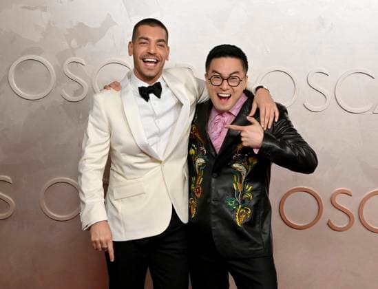 (L-R) Matt Rogers and Bowen Yang arrive on the red carpet for the 97th Academy Awards in the Hollywood section of Los Angeles on Sunday, March 2, 2025.  LAP20250302323 JIMxRUYMEN