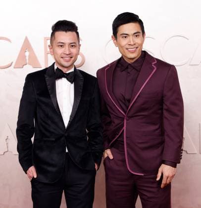 L-R: Jeremy Tran and Bing Chen, CEO & Co-Founder, Gold House arrive on the red carpet for the 97th Academy Awards in the Hollywood section of Los Angeles on Sunday, March 2, 2025.  LAP20250302720 JOHNxANGELILLO