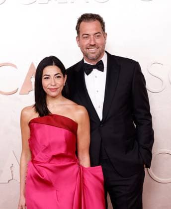 (L-R) Amy Homma, Director and President, Academy Museum and guest arrive on the red carpet for the 97th Academy Awards in the Hollywood section of Los Angeles on Sunday, March 2, 2025.  LAP20250302735 JOHNxANGELILLO