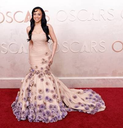 Kristy Sarah arrives on the red carpet for the 97th Academy Awards in the Hollywood section of Los Angeles on Sunday, March 2, 2025.  LAP20250302793 JOHNxANGELILLO
