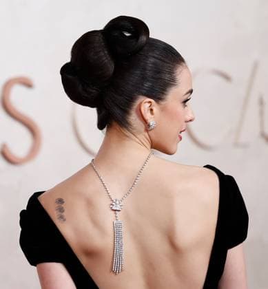 Margaret Qualley arrives on the red carpet for the 97th Academy Awards in the Hollywood section of Los Angeles on Sunday, March 2, 2025.  LAP20250302876 JOHNxANGELILLO