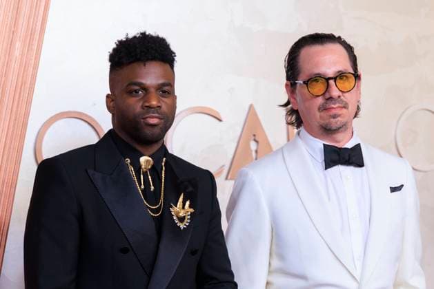 March 2, 2025, Hollywood, California, USA: (L) Abraham Alexander and Adrian Quesada on the red carpet of the 97th Annual Academy Awards on Sunday March 2, 2025 at the Dolby Theater in Hollywood, California. BURT HARRIS BNS PI Hollywood USA - ZUMAp124 20250302_zaa_p124_097 Copyright: xBurtxHarrisx