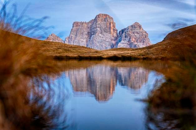 Creative Highlights World Monte Pelmo reflected in Baste lake at sunset, Dolomites Selva di Cadore, Veneto, Italy CR_ROMO250228-1670647-01