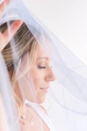 Creative Highlights Symbolfotos Ethereal close-up of a bride with a soft blue veil, exuding eleg United States, Colorado, Denver R_FBJQ250302A-1545231-01 ,model released, Symbolfoto