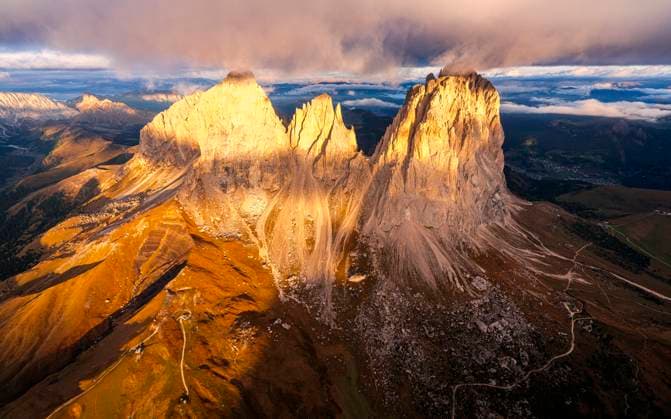 Creative Highlights World Sassopiatto and Sassolungo at sunset, Dolomites Selva di Val Gardena, Trentino-Alto Adige, Italy R_ROMO250228-1670679-01