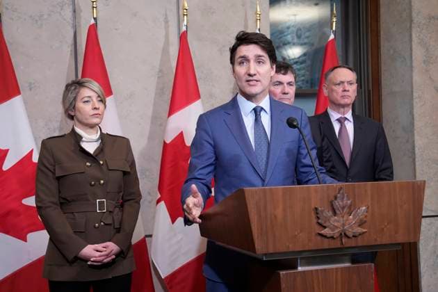 March 4, 2025, Ottawa, On, Canada: Prime Minister Justin Trudeau holds a news conference on imposed U.S. tariffs as Foreign Affairs Minister Melanie Joly, Finance Minister Dominic LeBlanc and Public Safety Minister David McGuinty look on in Ottawa on Tuesday, March 4, 2025. Ottawa Canada  - ZUMAc35_ 20250304_zaf_c35_015 Copyright: xAdrianxWyldx
