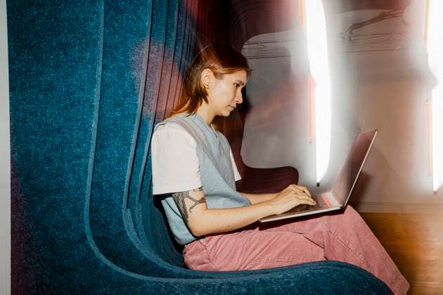 Creative Highlights Symbolfotos Female entrepreneur using laptop while sitting on seat Sweden, Stockholm, model released, property released Copyright: xMaskotx , MA116503 MA116503