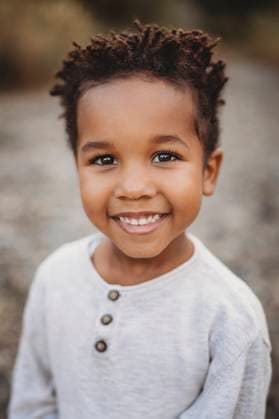 Creative Highlights Symbolfotos Portrait beautiful black 5 year old boy smiling outside in sumer Shenandoah, Virginia, United States CR_TANI250303-1668870-01 ,model released, Symbolfoto