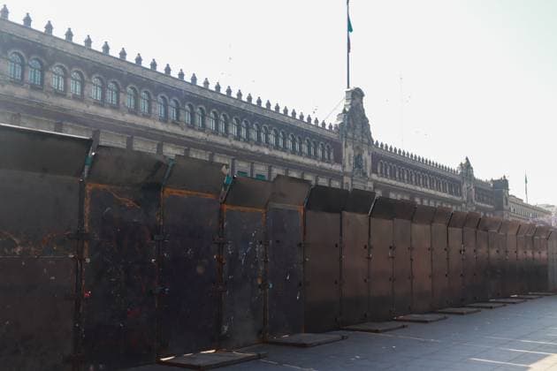 Metal fences are seen in front of the National Palace as a security measure to stop the demonstrators for the upcoming protest on International Women s Day. on March 5, 2025 in Mexico City, Mexico. Mexico City Mexico - ZUMAe321 20250305_zia_e321_080 Copyright: xCarlosxSantiagox
