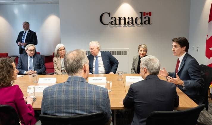 March 7, 2025, Montreal, Pq, CANADA: Prime Minister Justin Trudeau, right, flanked by from left to right, Michael Sabia, president and CEO, Hydro-Quebec, Isabelle Hudon, president of the Business Development Bank of Canada (BDC) Jean Charest, member of his council on Canada-U.S. relations, Foreign Affairs Minister Melanie Joly, Minister of Innovation, Science and Industry Francois-Philippe Champagne and Martin Caron, president of L Union des producteurs agricoles (UPA) and Veronique Proulx, president and CEO of Federation des chambres de commerce du Quebec (FCCQ), hosts a round table with business community leaders in Montreal on Friday, March 7, 2025. Montreal CANADA  - ZUMAc35_ 20250307_zaf_c35_046 Copyright: xChristinnexMuschix