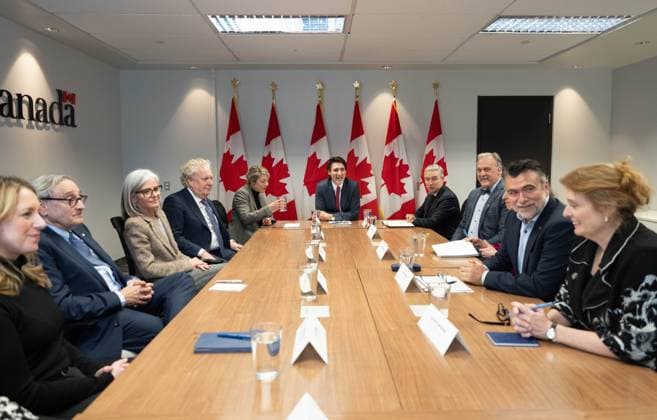 March 7, 2025, Montreal, Pq, CANADA: Prime Minister Justin Trudeau, centre, flanked by Foreign Affairs Minister Melanie Joly, and Minister of Innovation, Science and Industry Francois-Philippe Champagne hosts a round table with business community leaders in Montreal on Friday, March 7, 2025. Montreal CANADA  - ZUMAc35_ 20250307_zaf_c35_047 Copyright: xChristinnexMuschix