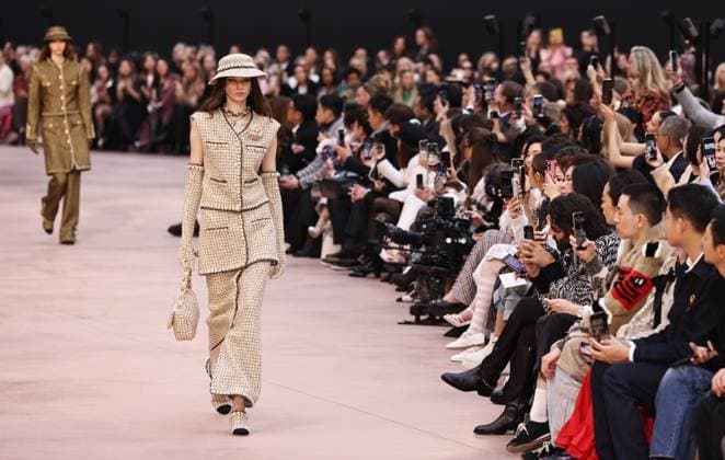 (250311) -- PARIS, March 11, 2025 -- Models present creations of the ready-to-wear Fall Winter 2025-2026 collections by French fashion house Chanel during the Paris Fashion Week, in Paris, France, on March 11, 2025. ) FRANCE-PARIS-FASHION WEEK-CHANEL GaoxJing 