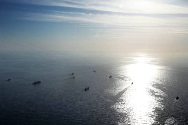 March 11, 2025, Indian Ocean, Gulf Of Oman, Iran: Warships from Iran, Russia, and China during joint military drills in the Indian Ocean and the Gulf of Oman. On the second day of the joint naval drill Maritime Security Belt 2025, naval forces from Iran, Russia, and China conducted aerial photography exercises and tactical formation maneuvers in the Indian Ocean and the Gulf of Oman. Helicopters from the Iranian Navy and the IRGC are monitoring the three-day exercise. The drill aims to enhance coordination among participating forces and strengthen maritime cooperation. Indian Ocean Iran - ZUMAi98_ 20250311_zih_i98_026 Copyright: xIranianxArmyxOfficex