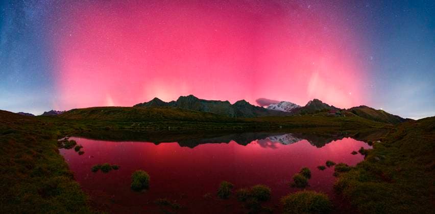 Creative Highlights World Aurora Borealis reflected in a lake, Valtellina, Italy Buglio In Monte, Lombardia, Italy CR_ROMO2503104D-1671563-01