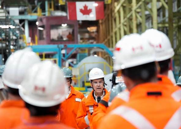 March 12, 2025, Hamilton, On, CANADA: Canadian Prime-minister designate Mark Carney, centre, speaks to steel workers as he tours the ArcelorMittal Dofasco steel plant in Hamilton, Ont., on Wednesday, March 12, 2025. Hamilton CANADA - ZUMAc35_ 20250312_zaf_c35_045 Copyright: xNathanxDenettex